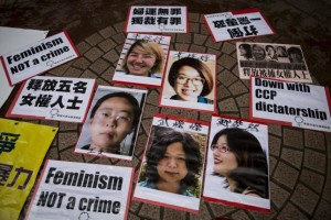 Portraits of Chinese female activists are pictured during a protest calling for their release in Hong Kong