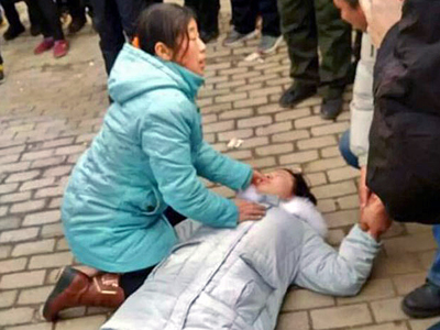 The daughter of Chinese rights lawyer Shu Xiangxin