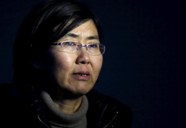 Human rights lawyer Wang Yu talks during an interview with Reuters in Beijing in this March 1, 2014 photo. REUTERS/Kim Kyung-Hoon/Files