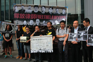 Activists in Hong Kong demonstrate for the release of rights lawyers detained on the Chinese mainland