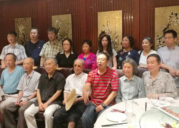 Staff of Chinese cutting edge political magazine Yanhuang Chunqiu at a gathering