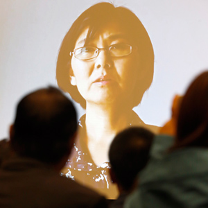 A photo of Chinese lawyer Wang Yu is seen on a screen during the first ABA International Human Rights Award ceremony at the ABA Annual Meeting in San Francisco