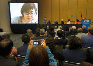 ABA leaders and members gathered to honor Wang Yu for her human rights work. Photo by Tony Avelar.