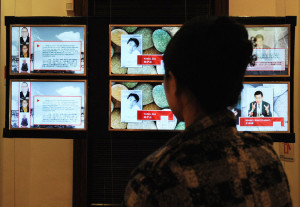 Video screens tell the stories of political prisoners at the Laogai Museum in Washington