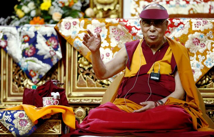 Tibet's exiled spiritual leader the Dalai Lama gestures during a teaching event in Milan, Italy October 21, 2016. REUTERS/Alessandro Garofalo
