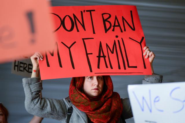 Demonstrators shout slogans during anti-Donald Trump immigration ban protests outside Terminal 4 at San Francisco International Airport in San Francisco, California, U.S., January 28, 2017. REUTERS/Kate Munsch