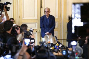 French writer Patrick Modiano poses for journalists after a news conference at the French publishing house Gallimard in Paris