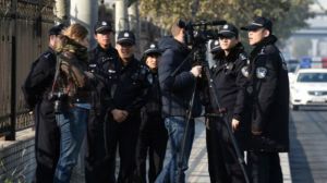 141121075917_police_at_the_gaoyu_trial_624x351_getty_nocredit