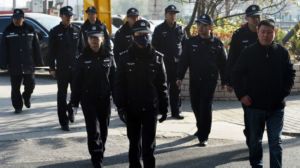 141121080347_police_patrol_at_gaoyu_trial_624x351_getty_nocredit