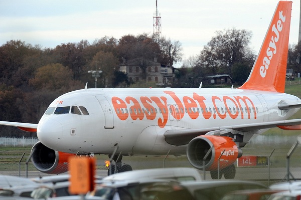 An Easy Jet A320 aircraft drives after landing on December 26, 2014  in the Toulouse-Blagnac airport in Blagnac, southern France. Easy Jet's traffic was slightly disrupted  on December 26 with 38 flights cancelled due to a strike by its French  hostesses and flight attendants. The airline company's worker's unions announced a new strike to take place on New Year's Eve.  AFP PHOTO / REMY GABALDA / AFP PHOTO / REMY GABALDA