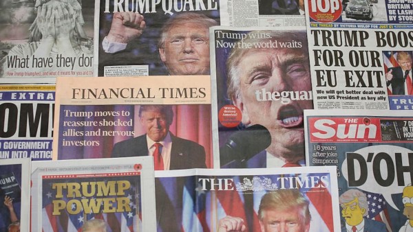 LONDON, ENGLAND - NOVEMBER 10: British newspapers show U.S. Republican candidate and President Elect Donald Trump on their front pages the day after Trump was announced the winner in U.S. presidential elections on November 10, 2016 in London, England. The American public have voted for the Republican candidate Donald Trump to be the 45th President of the United States. After 46 of the 50 States declared he had 278 of the 538 electoral college votes and Hillary Clinton conceded defeat in a telephone call. British Prime Minister Theresa May congratulated Trump releasing a statement promising to work with him to build on the special relationship between the UK and the USA. (Photo Illustration by Dan Kitwood/Getty Images)