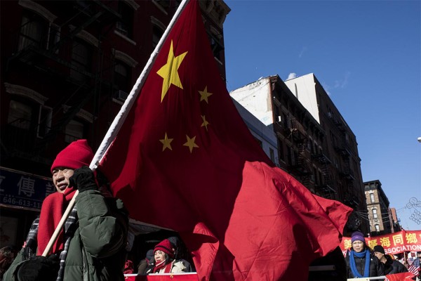 NEW YORK, NY - FEBRUARY 14: People gather for a Lunar New Year's parade in Chinatown in New York City on February 14, 2016. The new year starts the year of the monkey. (Photo by Andrew Renneisen/Getty Images)