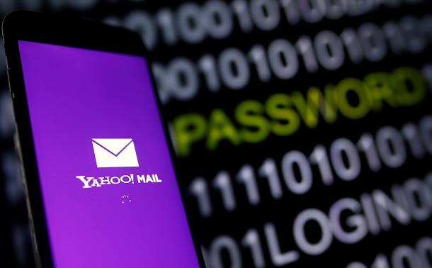 Yahoo Mail logo is displayed on a smartphone's screen in front of a code in this illustration taken in October 6, 2016. REUTERS/Dado Ruvic - RTSQXZA