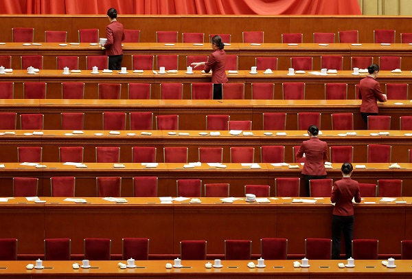 Tea attendants serve after the closing session of the 19th National Congress of the Communist Party of China at the Great Hall of the People, in Beijing, China October 24, 2017. REUTERS/Jason Lee