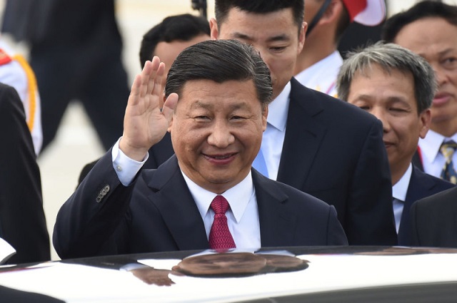 China's President Xi Jinping arrives at the international airport ahead of the Asia-Pacific Economic Cooperation (APEC) Summit in the central Vietnamese city of Danang on November 10, 2017. World leaders and senior business figures are gathering in the Vietnamese city of Danang this week for the annual 21-member APEC summit.  / AFP PHOTO / Ye Aung Thu        (Photo credit should read YE AUNG THU/AFP/Getty Images)