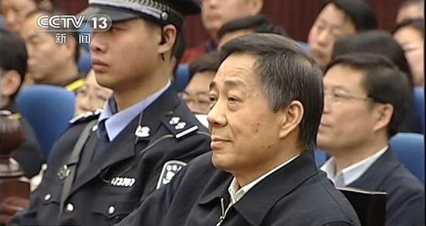 This screen grab taken from CCTV footage released on October 25, 2013 shows fallen politician Bo Xilai (R) standing in the court room of Shandong High Court in Jinan, east China's Shandong province. The court on October 25 rejected Bo Xilai's appeal against his conviction and confirmed his life sentence, state media reported, a ruling likely to seal his fate as authorities look to close a damaging scandal.  AFP PHOTO / CCTV----EDITORS NOTE---- RESTRICTED TO EDITORIAL USE - MANDATORY CREDIT "AFP PHOTO / CCTV - NO MARKETING NO ADVERTISING CAMPAIGNS - DISTRIBUTED AS A SERVICE TO CLIENTS